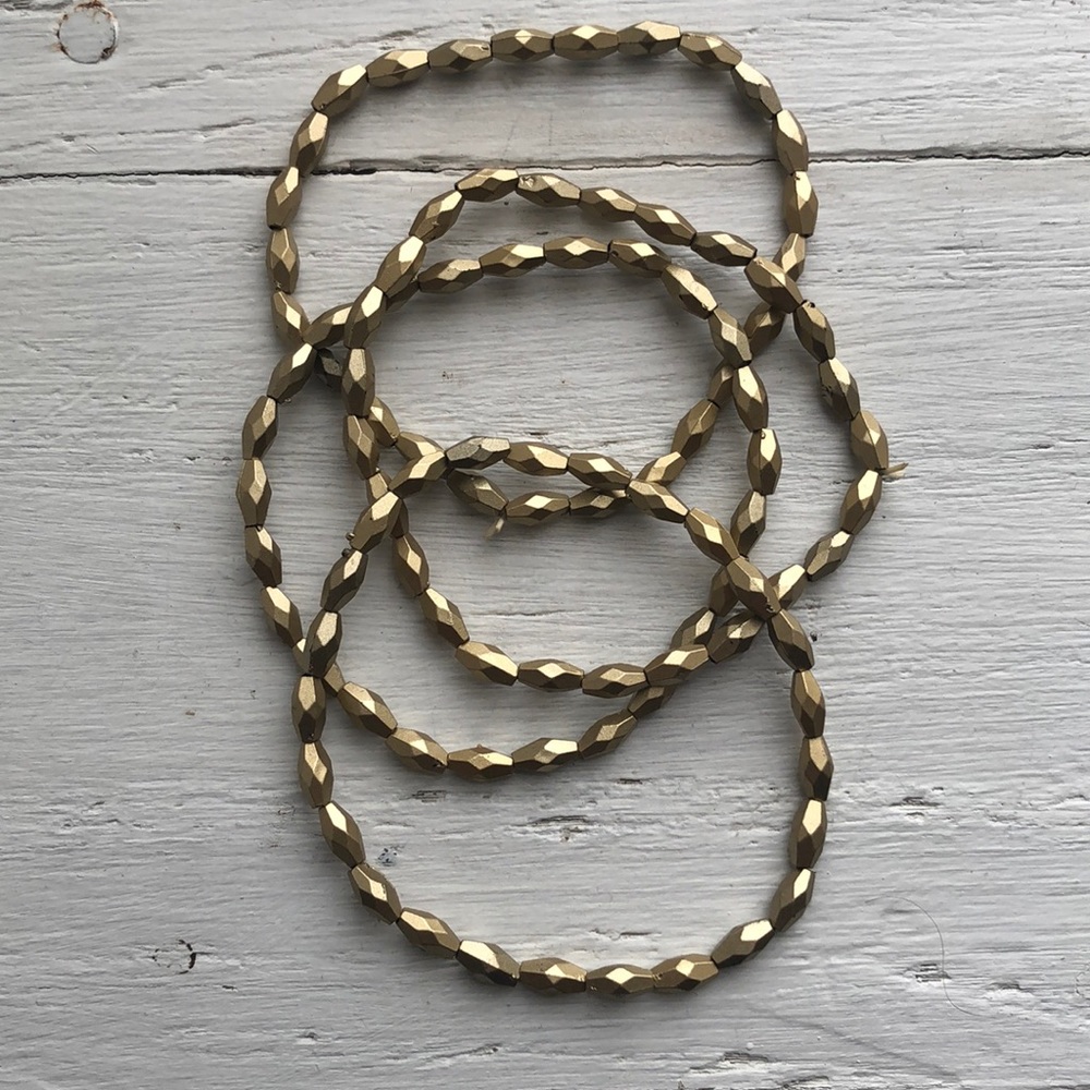 Set of 4 gold beaded bracelets